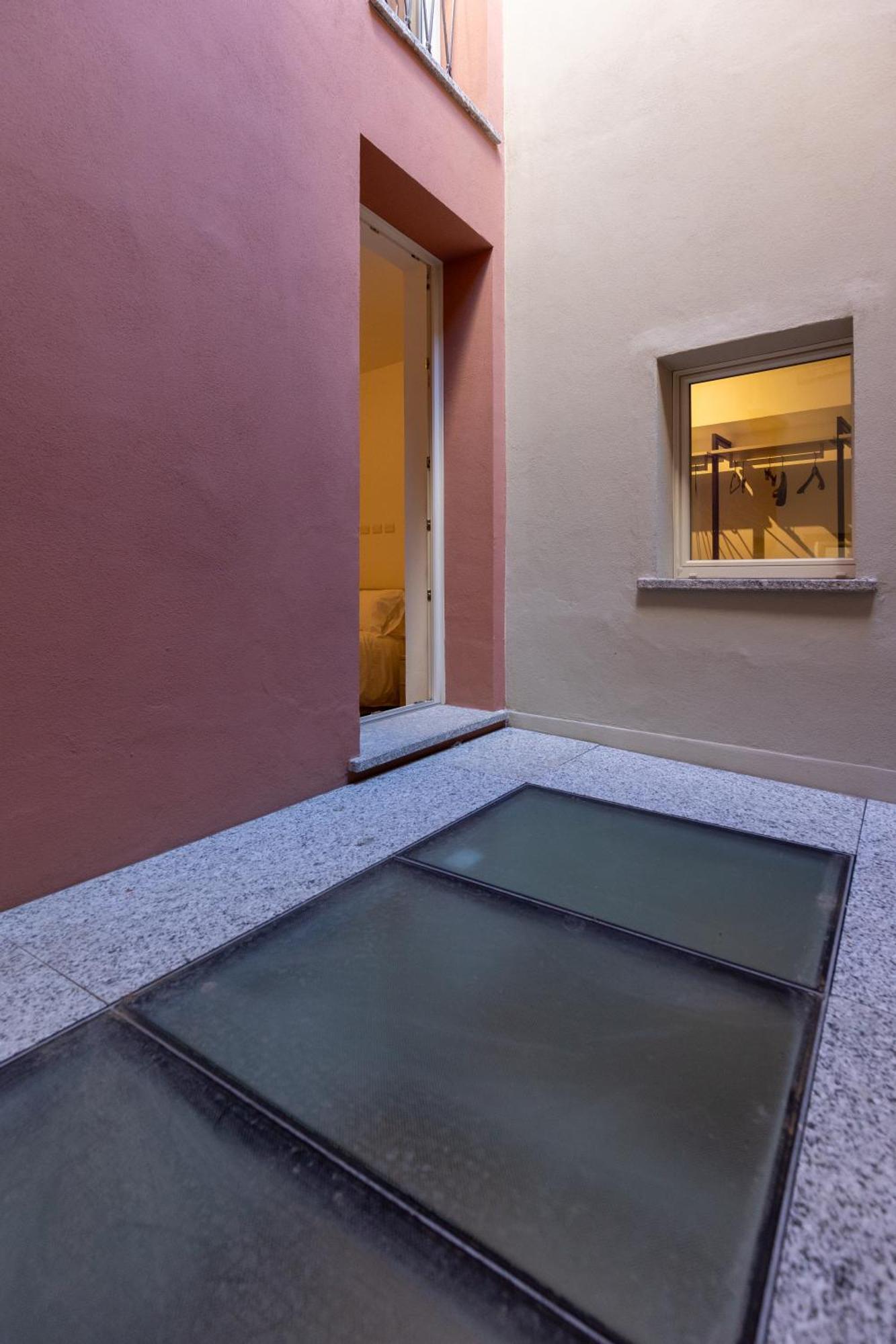 Piazza Del Lago Suites 梅纳焦 外观 照片